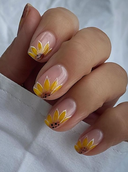 Yellow Nails With A Sunflower Design