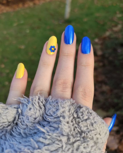 Blue And Yellow Nail Manicure