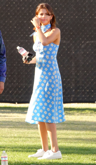 Selena Gomez In A Pastel Blue Dress With A Floral Design